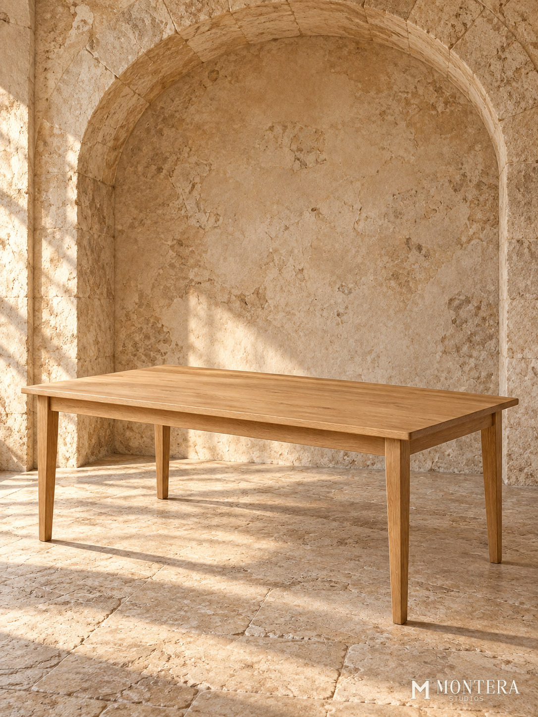 Oak Field Table in a timeworn limestone atelier